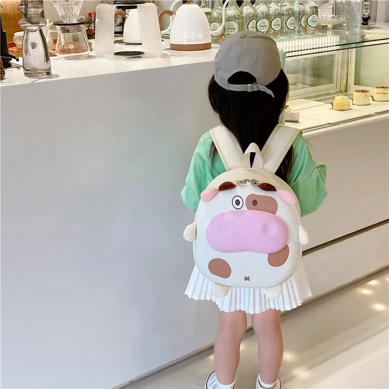 Высококачественный новый ручной рюкзак с твердой оболочкой Модный милый милый милый корова детский рюкзак тренд студенческий рюкзак